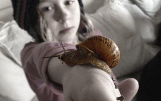 Instagram photo of Little Girl With Snail